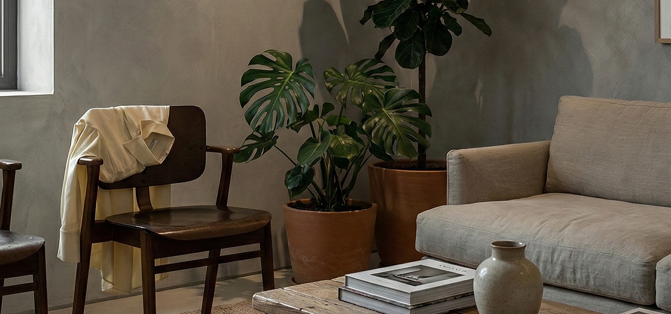 Cozy interior with plants and wooden furniture.