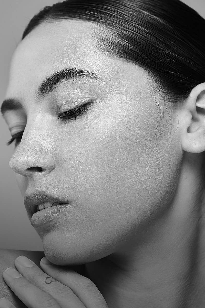 Profile of a woman in black and white.
